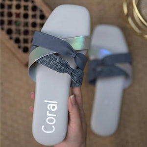 Step into Summer: Top 10 Designer Flat Sandals for Ladies - Coral Haze